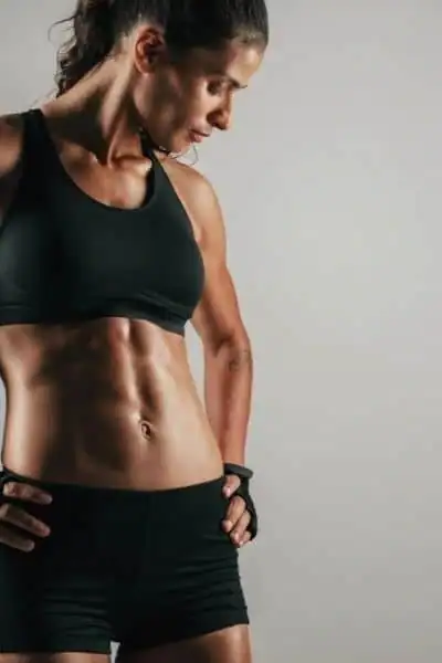 Toning Up at Home: The Ultimate Guide to Bodyweight Exercises 2 Image of woman's toned stomach after bodyweight exercises Port Glasgow and non-surgical treatment from Lipo 360