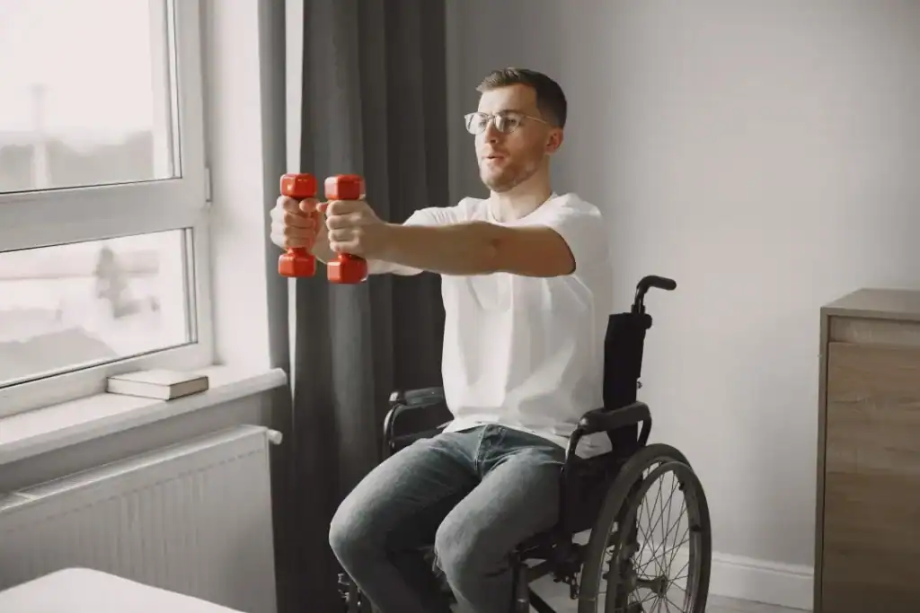 Empowering Weight Loss: A Comprehensive Guide for Individuals with Disabilities 1 Image of man doing exercise in his wheelchair to aid weight loss Port Glasgow