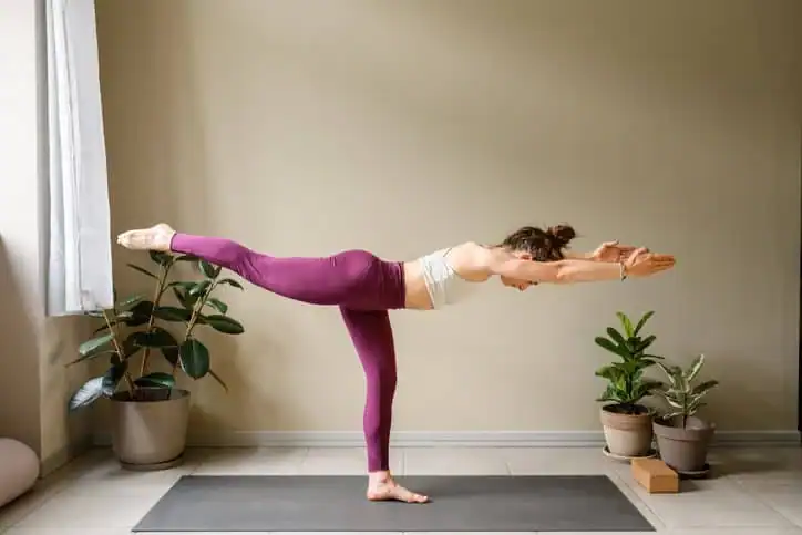 Achieving the Perfect Tone: How Often Should You Exercise for Results? 1 Woman doing Yoga exercise Port Glasgow to help with toning the body.