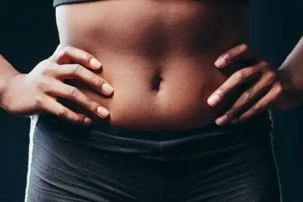 Toning Your Stomach: The Ultimate Guide to Achieving a Sculpted Stomach While Shedding Pounds 1 Image of a toned stomach after non surgical treatment Port Glasgow